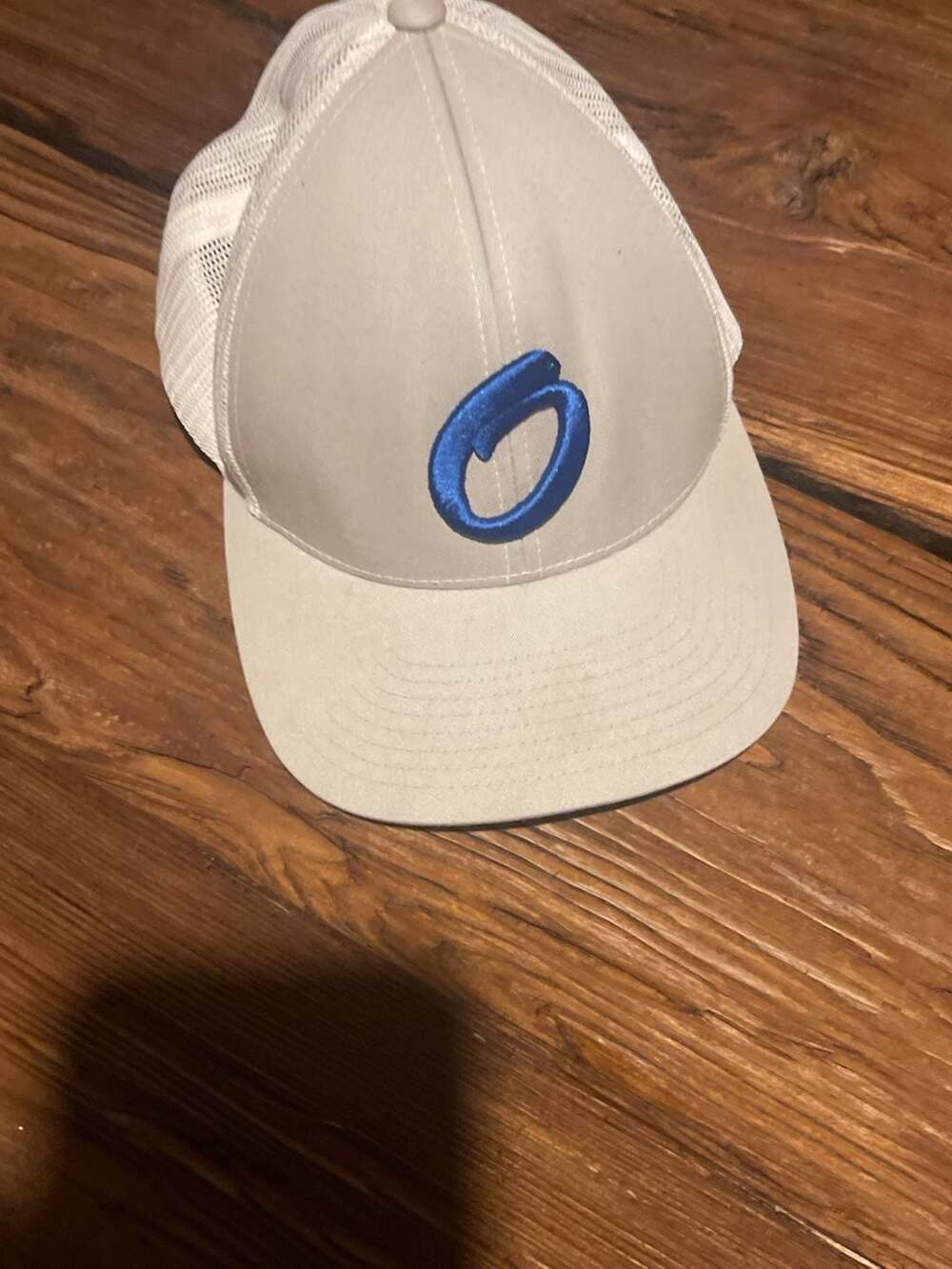 Pacific Headwear 104C Pro Model Grey and White Mesh Trucker Hat with Blue Logo